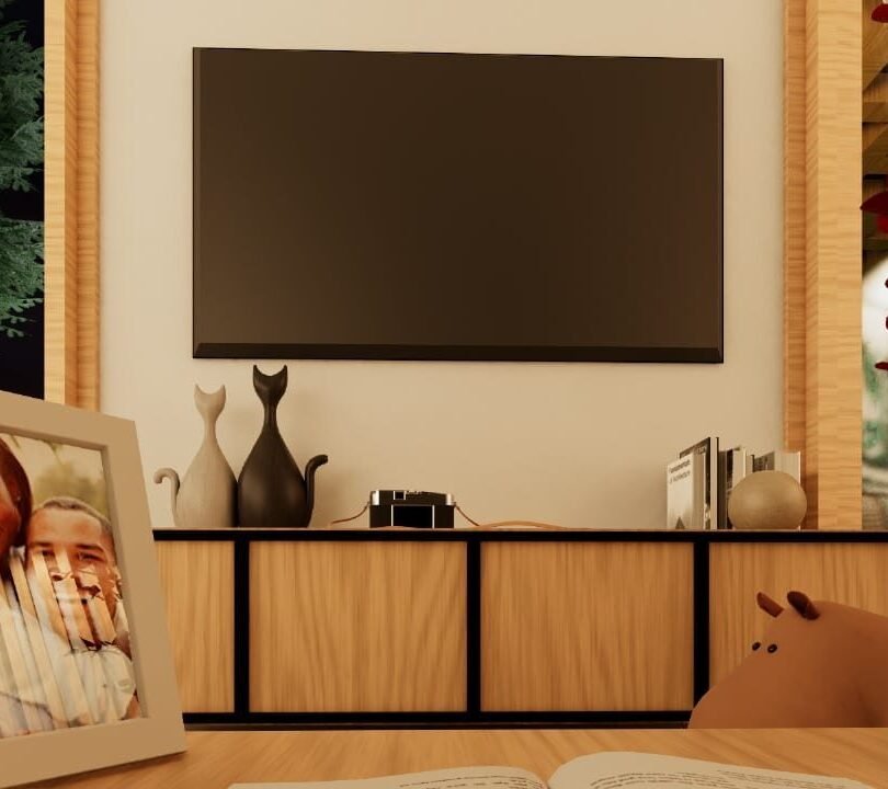Cozy living room with framed photo and decorative items.