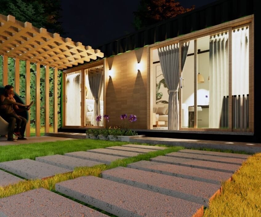 Couple relaxing outside a modern garden house at night