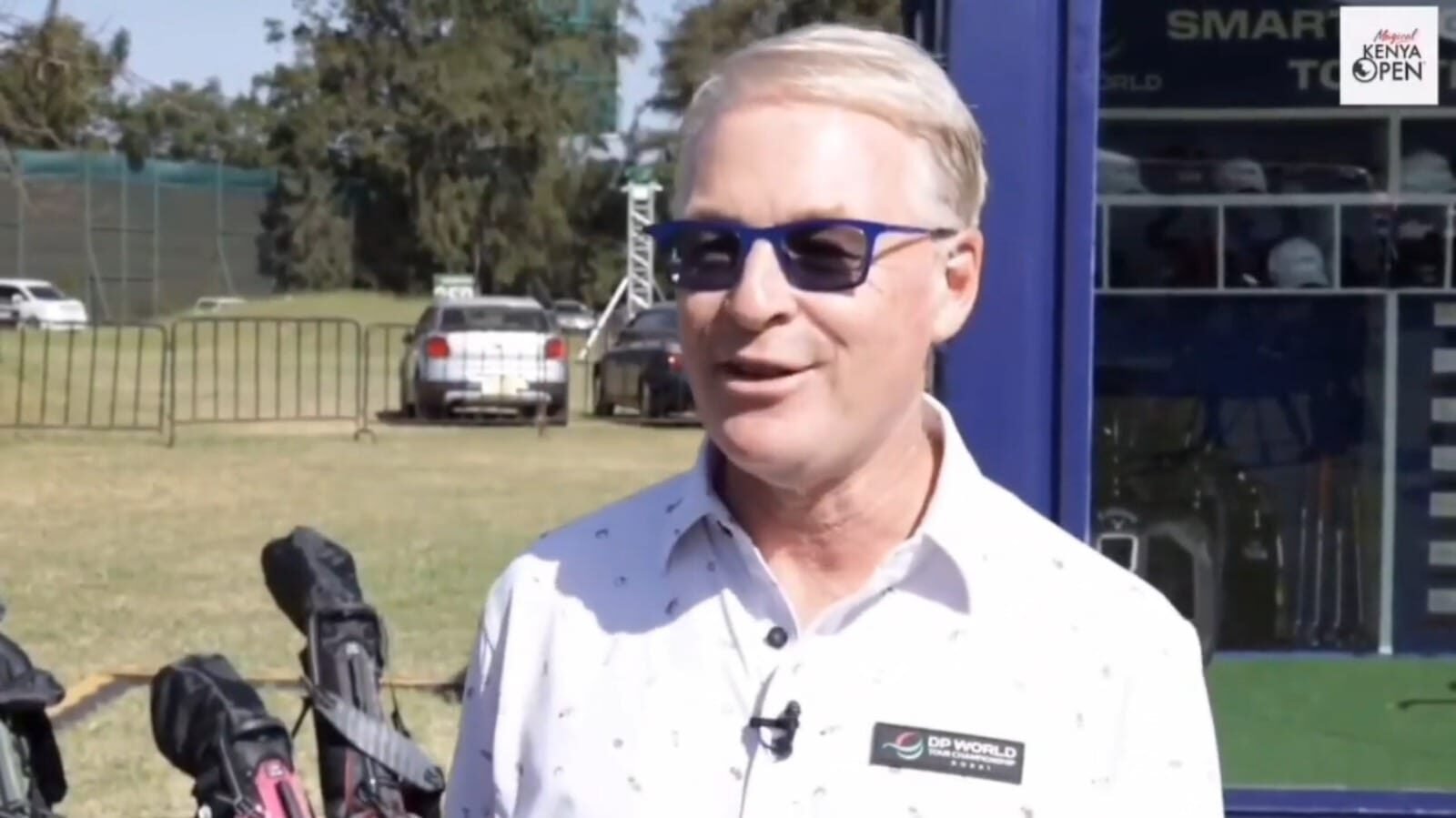 Person speaking at the Kenya Open golf event.