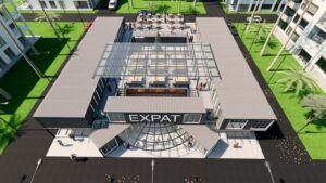 Aerial view of modern expat center with outdoor seating.