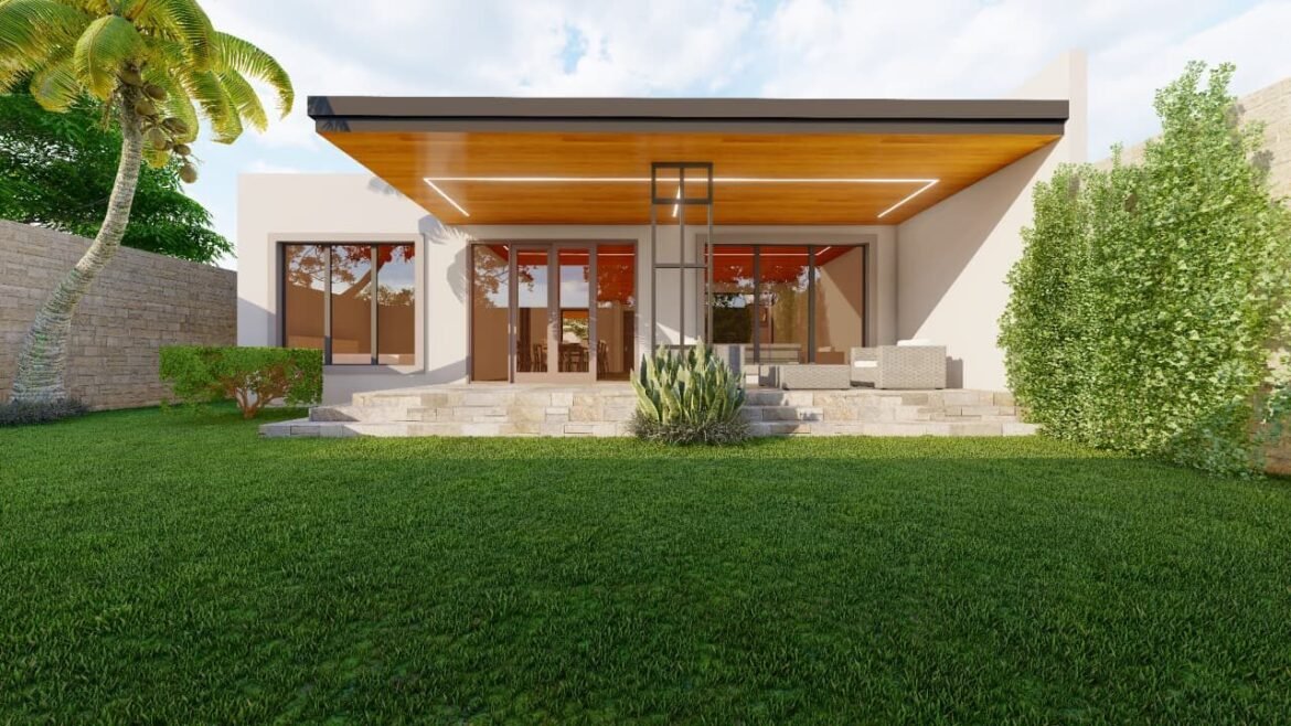 Modern house exterior with lush green lawn and palm trees.