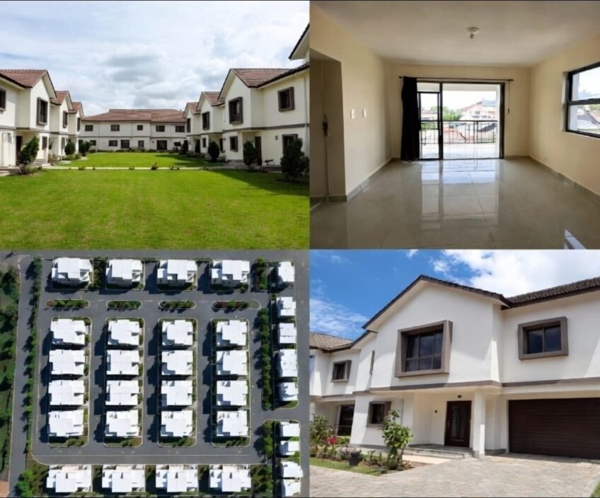 Modern housing complex with green lawn and spacious interiors.