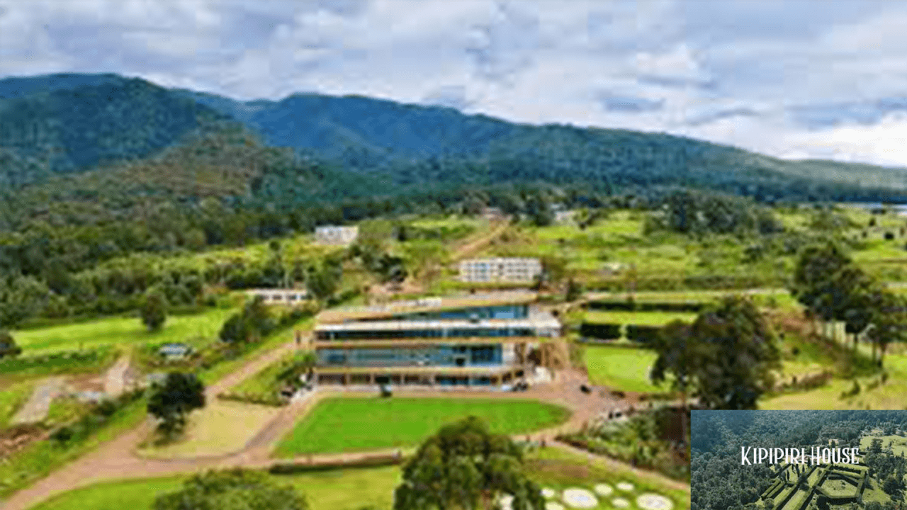 Aerial view of Kipipiri House surrounded by lush green mountains.
