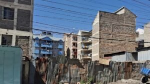 View of buildings and metal fences in urban Nairobi.