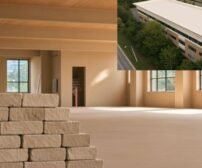 Interior space with brick stack and building exterior view.